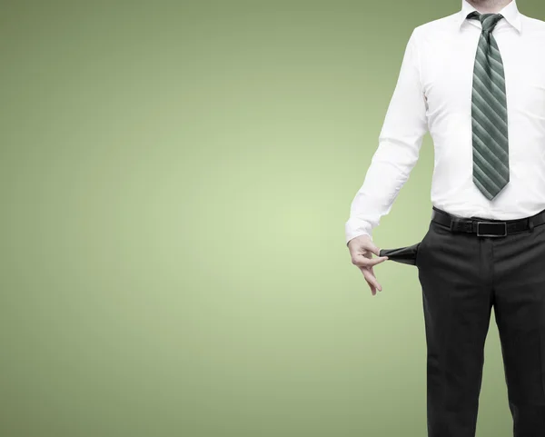 Homem de negócios de pé com bolsos virados do avesso — Fotografia de Stock