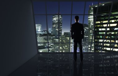 Akşam şehre bakan adam