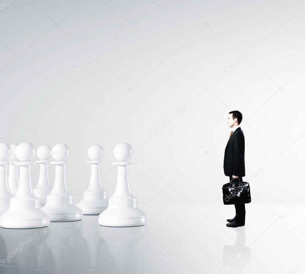 businessman and pawns