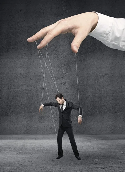 Businessman marionette — Stock Photo, Image