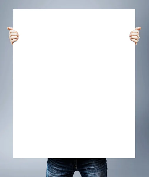 Adam tutarak boş poster — Stok fotoğraf