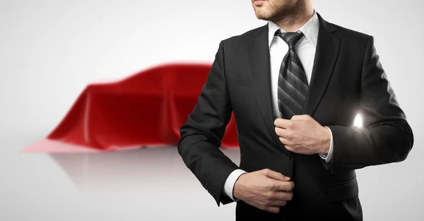 Man straightens his tie — Stock Photo, Image