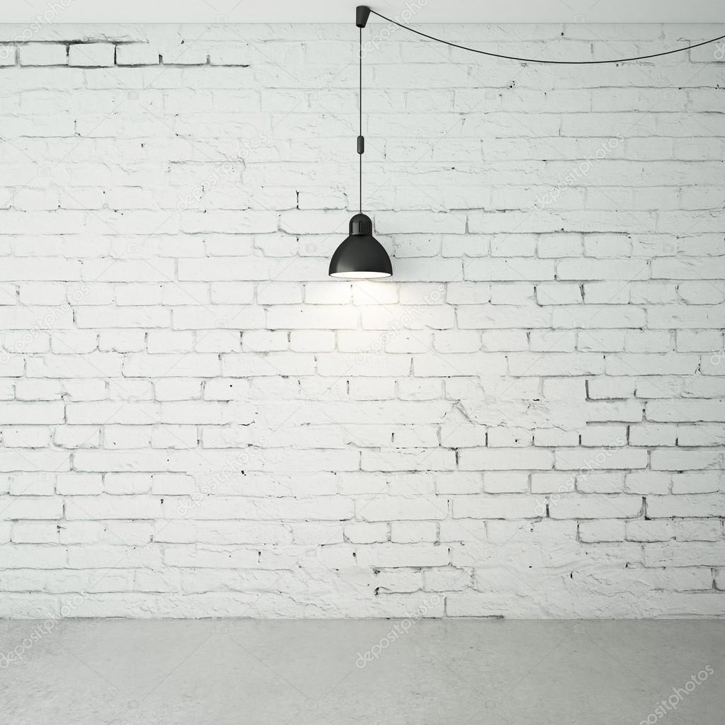 brick room with ceiling lamps