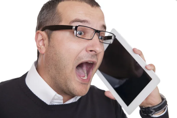 Businessman holding a table  and screaming. — Stock Photo, Image