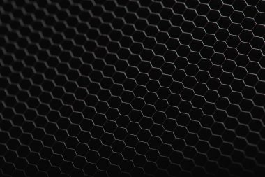 Siyah demirden bir panorama, plastik altıgen doku. Endüstriyel ağ geçmişi. Seçici odaklı düşük tuş