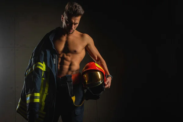 Young Handsome Adult Muscular Firefighter Uniform Holding Fire Equipment His — Stock Photo, Image