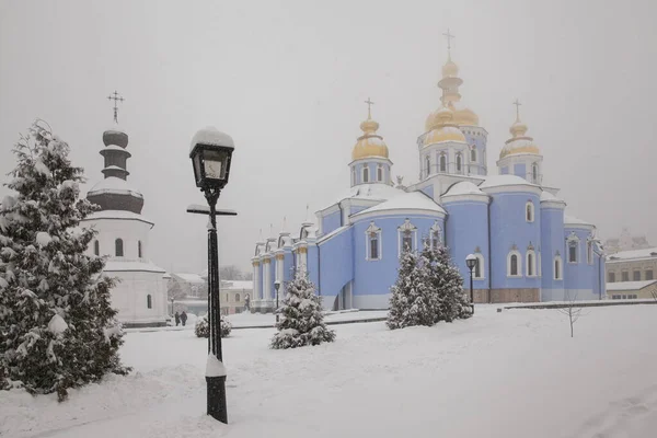 Michael's Golden Domed Cathedral in winter snowfall. Kiev.  Ukraine