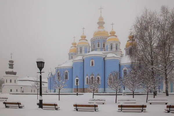 Michael\'s Golden Domed Cathedral in winter snowfall. Kiev.  Ukraine