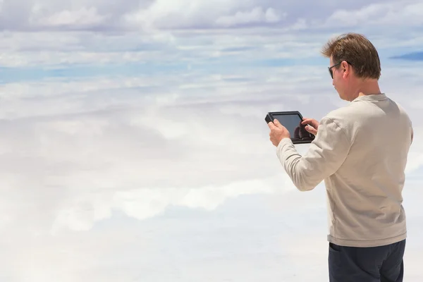 Man working on a digital tablet — Stock Photo, Image