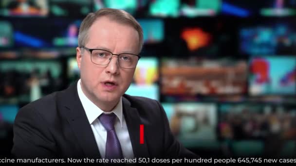 TV news presenter talking breaking news about coronavirus and vaccination — Stock Video