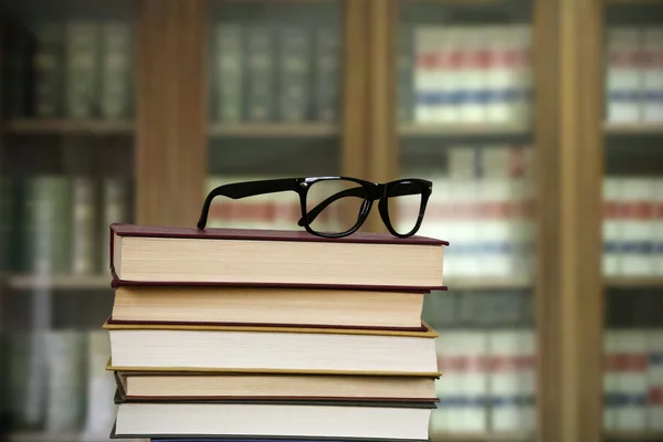 Glasses on the books — Stock Photo, Image