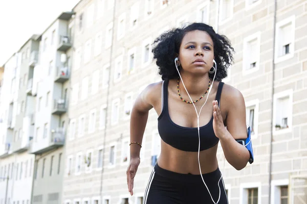 Young woman running — Stock Photo, Image