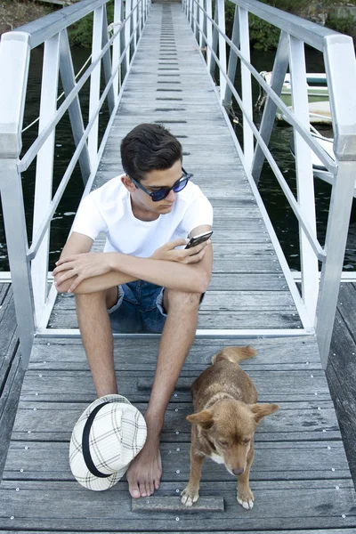young man with dog