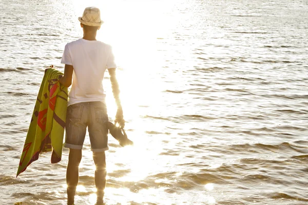 Young man on the beach — Stock Photo, Image