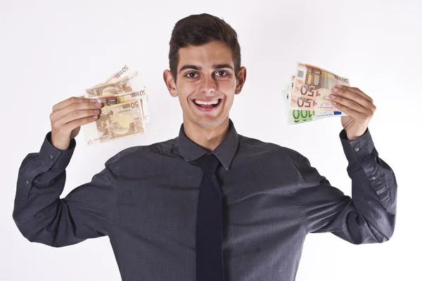 Νεαρός άνδρας με μετρητά — Φωτογραφία Αρχείου