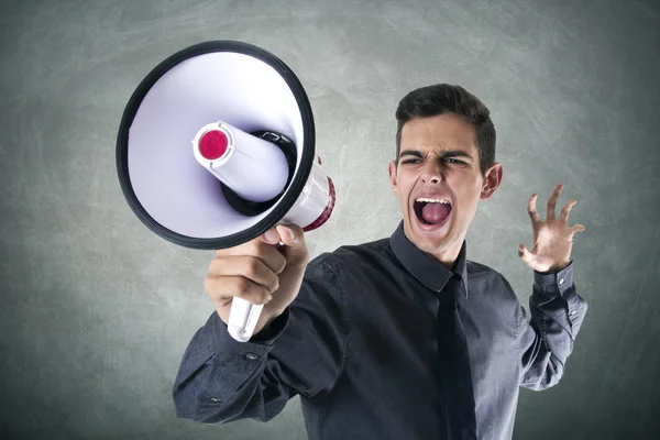 Hombre de negocios con megáfono — Foto de Stock