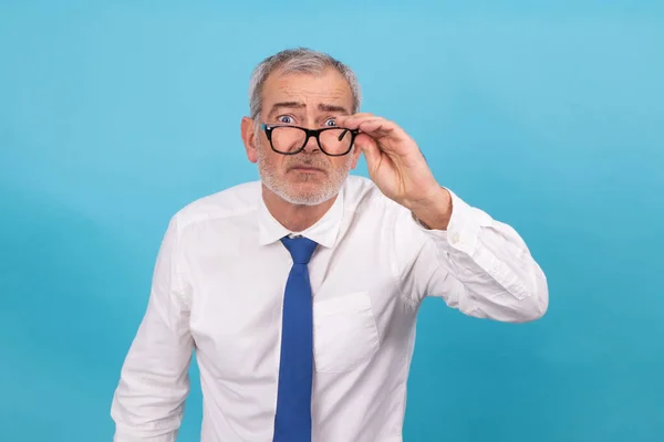 business man looking with glasses with presbyopia isolated