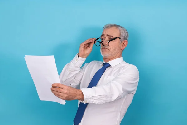 business man looking with glasses with presbyopia isolated