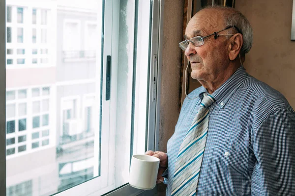 Senior Man Cup Coffee Home Looking Out Window — Stock Photo, Image