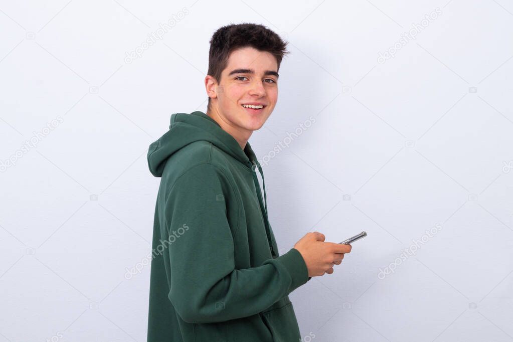 young teenager or student isolated with mobile phone