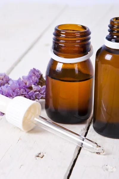 Bottles of massage oil — Stock Photo, Image