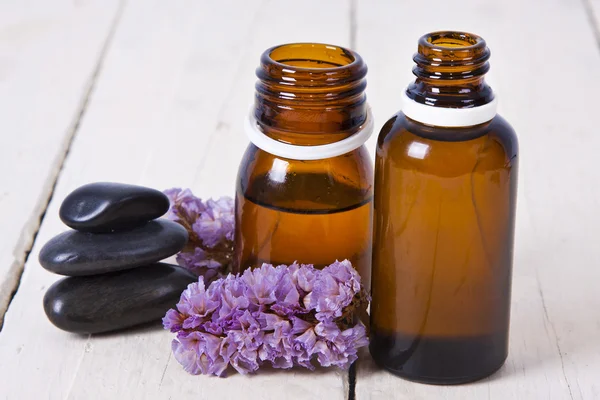 Bottles of massage oil — Stock Photo, Image