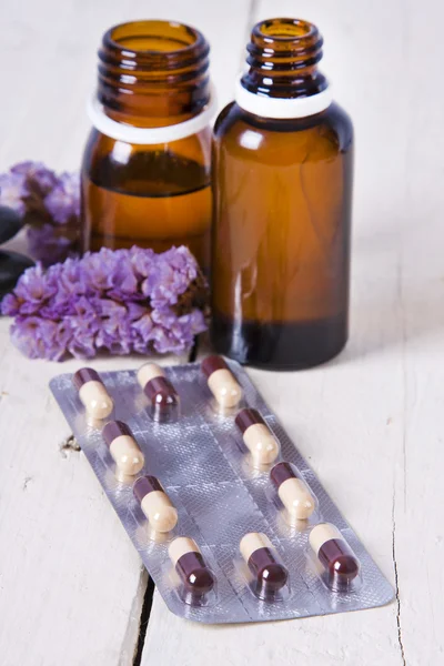 Bottles of massage oil — Stock Photo, Image