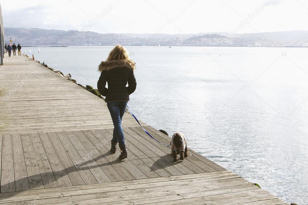 Girl walking the dog