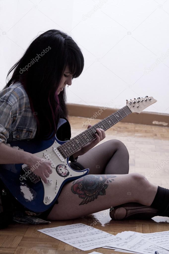 Girl playing guitar