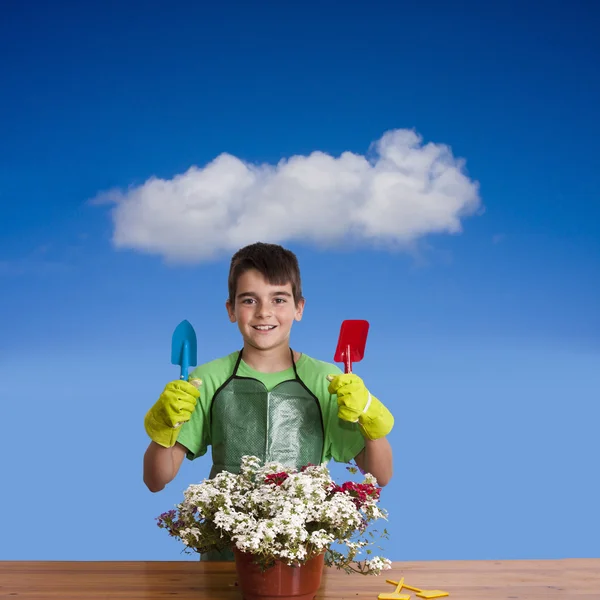 Child with garden plants — Stock Photo, Image