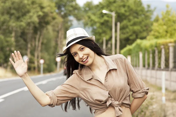 Woman on the road — Stock Photo, Image