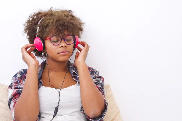 Gir listening to music — Stock Photo, Image