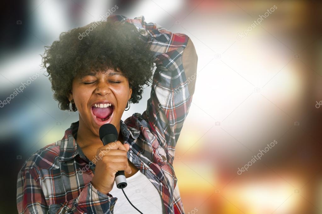 girl singing with microphone