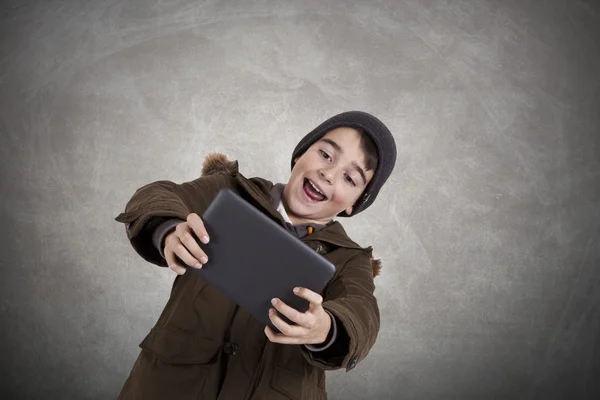 Criança com Tablet móvel — Fotografia de Stock