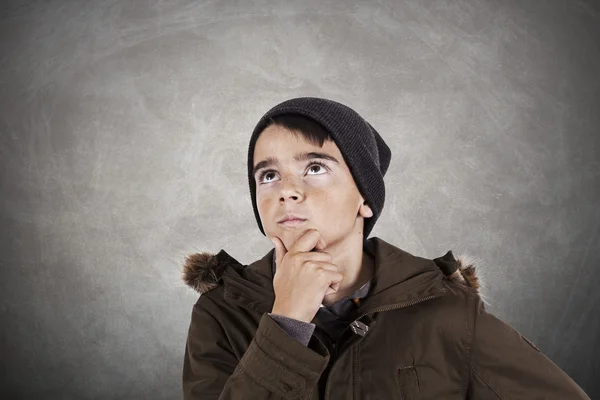 Thoughtfully child on abstract background — Stock Photo, Image