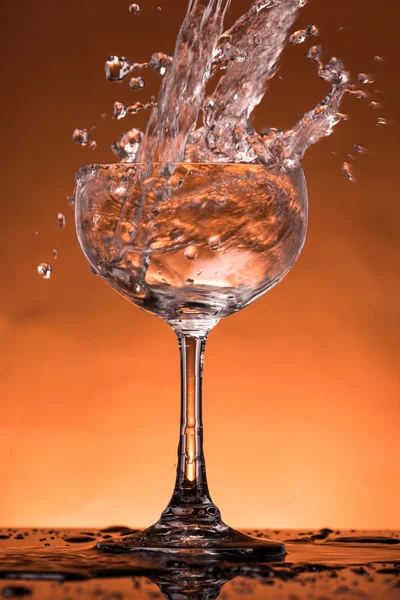 Water splash in a glass — Stock Photo, Image