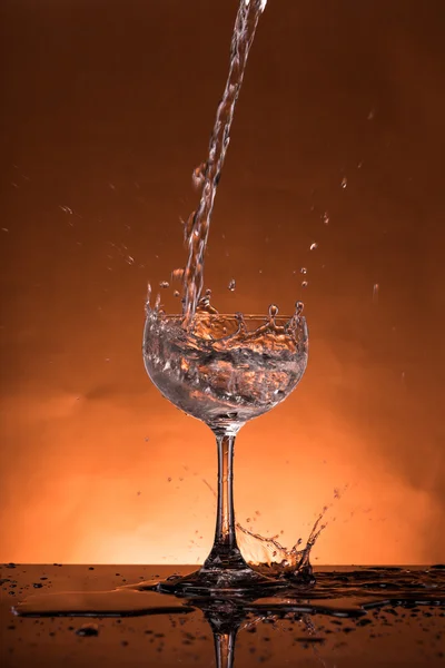 Water splash in a glass — Stock Photo, Image