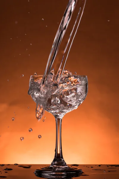 Water splash in a glass — Stock Photo, Image