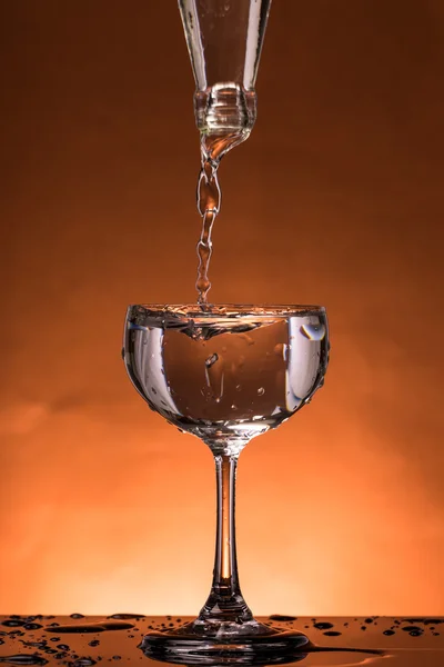 Water splash in a glass — Stock Photo, Image