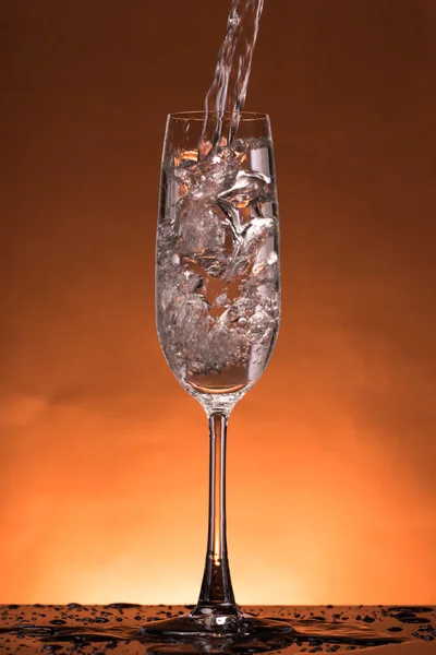 Water splash in a glass — Stock Photo, Image