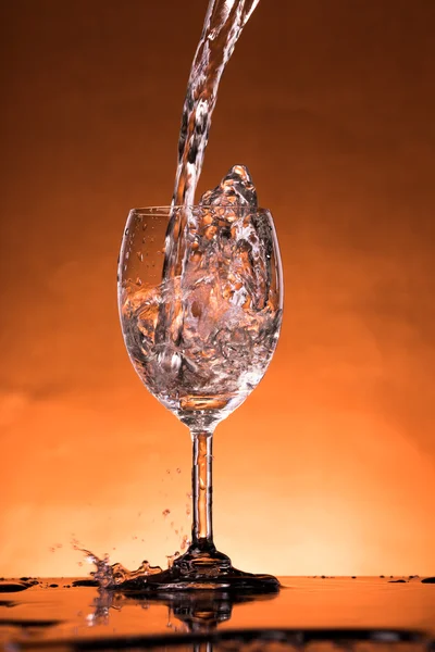 Water splash in a glass — Stock Photo, Image