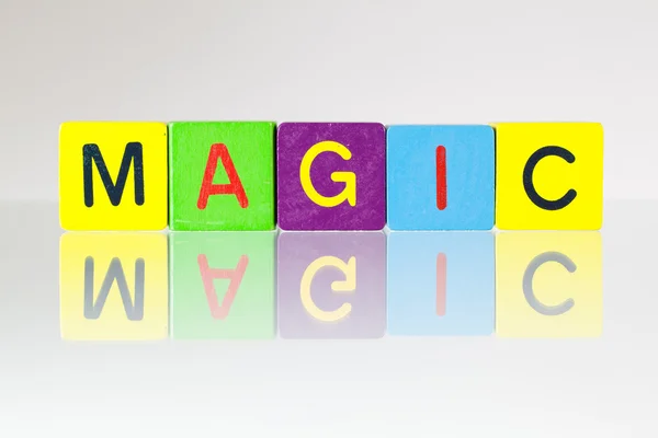 Magia - uma inscrição de blocos de crianças — Fotografia de Stock
