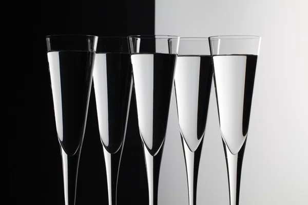 Glasses of water on the glass desk — Stock Photo, Image