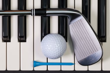 Piano keyboard and different golf equipments clipart