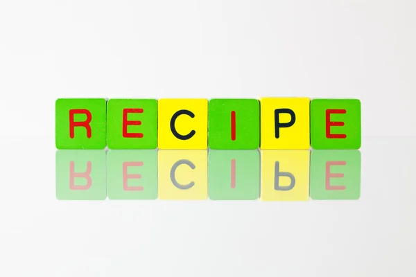 Recipe - an inscription from children's blocks — Stock Photo, Image