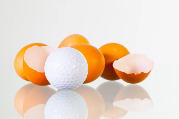 New golf season - eggs and golf ball — Stock Photo, Image
