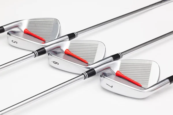 Titanium golfclubs op de witte tafel — Stockfoto