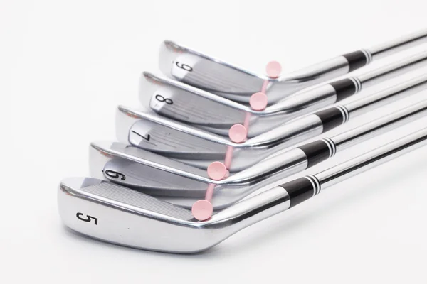 Titanium golfclubs op de witte tafel — Stockfoto