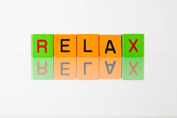 Relax - la inscripción de los bloques infantiles —  Fotos de Stock