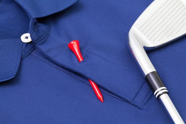 Camisa pólo azul e equipamentos de golfe — Fotografia de Stock